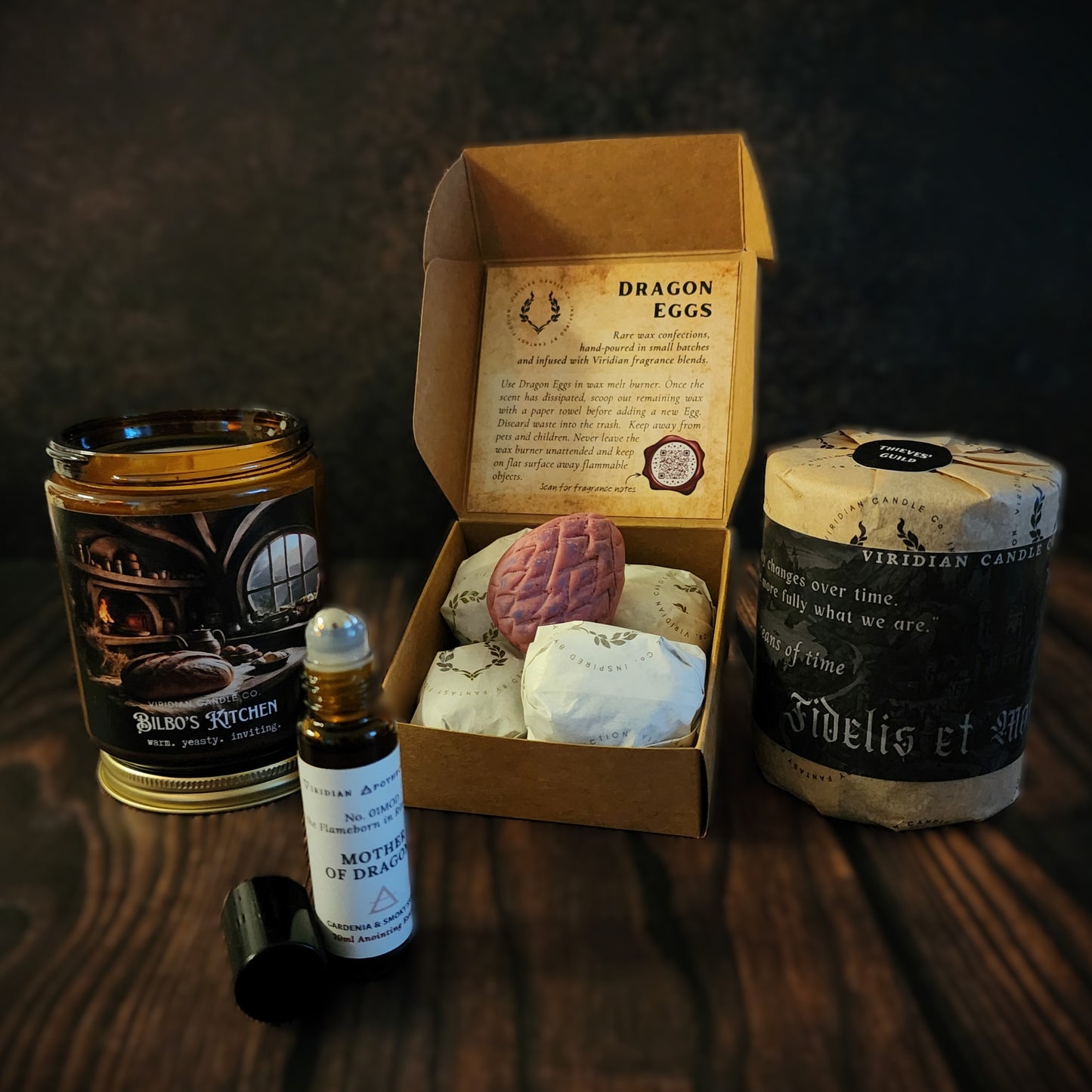 Dragon’s Hoard fantasy gift bundle featuring artisan candles, dragon egg decor and amber glass essence.