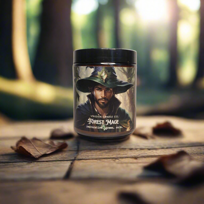 Forest Mage candle on a wood surface in a forest